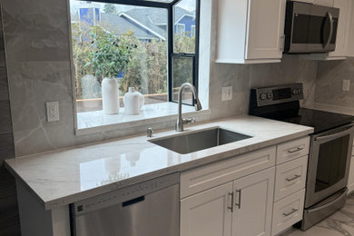 Example of a minimalist kitchen design in Seattle