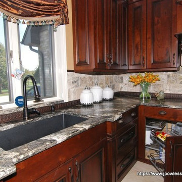 Kitchen Knotty cherry with black wrought iron accents