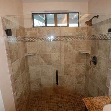 Custom Mosaic Border Row Frameless Shower doors in Laguna Niguel