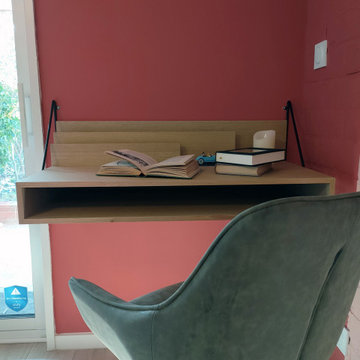 Un espace bibliothèque & détente dans un sous-sol