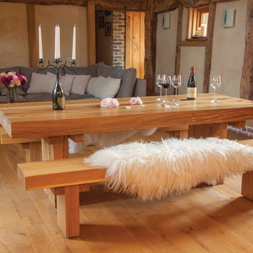Rustic modern dining room in a converted barn in Sussex