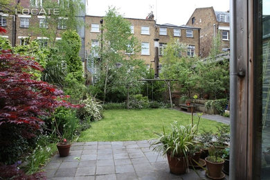 This is an example of a rustic back garden in London.