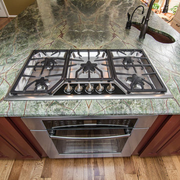 Red Dragon Granite + Rainforest Green Granite + Copper Fixtures