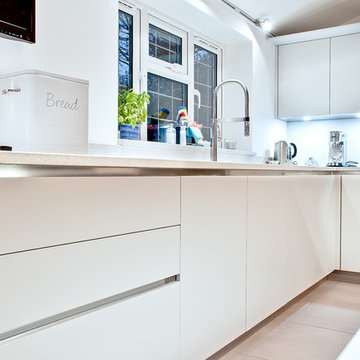 Satin Lacquer in Lava Grey and Light Grey with Quartz Worktops