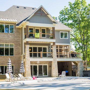 Two Story Stone Home with Great Outdoor Living Space