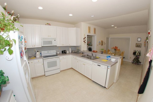 White Kitchen With Azul Aran Granite Countertops