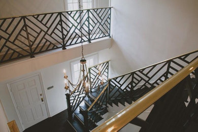 Staircase - large contemporary metal spiral metal railing staircase idea in New Orleans with metal risers