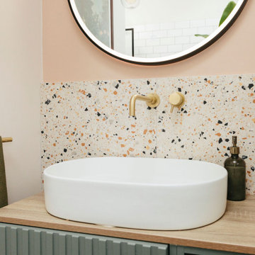 Pink & green bathroom with mix of tiles & patterns