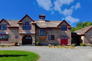 Example of a cottage exterior home design in Providence