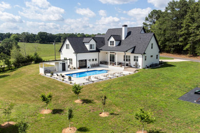 Cottage home design photo in Other