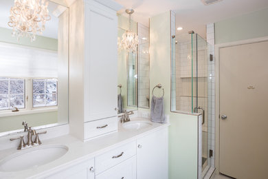 Inspiration for a mid-sized victorian master white tile and ceramic tile alcove shower remodel in Calgary with white cabinets, quartz countertops, recessed-panel cabinets, green walls, an undermount sink and a hinged shower door
