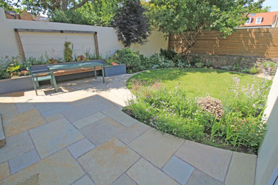 Contemporary garden in Other.