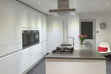 Kitchen - contemporary kitchen idea in Surrey