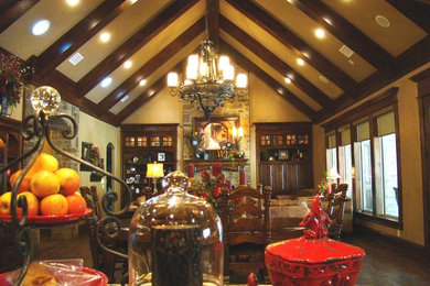 Example of a classic formal and open concept dark wood floor living room design in Austin with beige walls, a standard fireplace and a stone fireplace