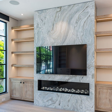 Avalanche Quartzite Leathered Floor to Ceiling Fireplace