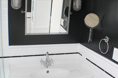 Example of a mid-sized classic 3/4 white tile and porcelain tile porcelain tile corner shower design in Los Angeles with an integrated sink, flat-panel cabinets, white cabinets, quartz countertops and white walls