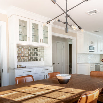 White Transitional Kitchen, Dining and Sunroom Renovation