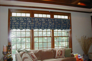 Living room - small transitional enclosed medium tone wood floor living room idea in Bridgeport with a music area, beige walls, no fireplace and no tv
