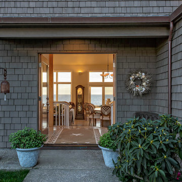 As you walk in the front door you look through to the ocean.