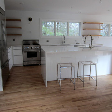 EAST HAMPTON 2 1/4" RED OAK INSTALLED & FINISHED W BONA AMBERSEAL AND TRAFFIC HD