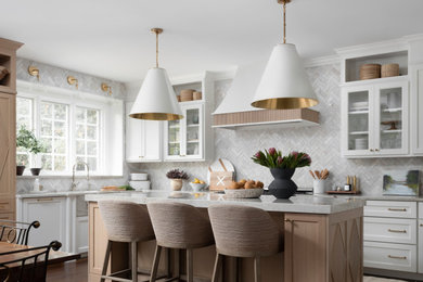 Open concept kitchen - mid-sized transitional u-shaped dark wood floor, brown floor and wood ceiling open concept kitchen idea in Chicago with a farmhouse sink, flat-panel cabinets, white cabinets, quartzite countertops, white backsplash, terra-cotta backsplash, paneled appliances, an island and gray countertops
