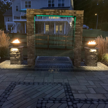 Patio with Water feature, Techo bloc and Trex producs