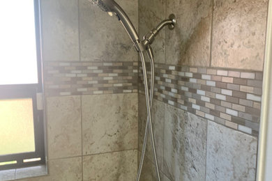Corner bathtub - mid-sized modern 3/4 beige tile and ceramic tile beige floor corner bathtub idea in San Francisco with a one-piece toilet, beige walls and a built-in vanity