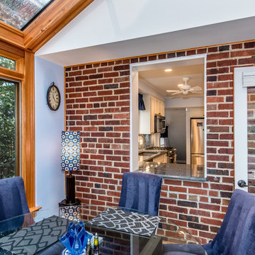 Brick interior sunroom with strategically placed window for an exquisite experie