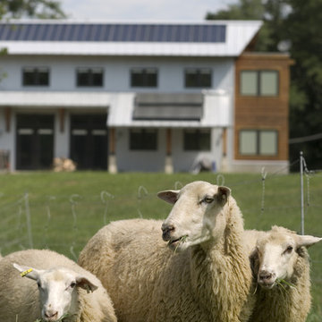 Green Dirt Farm - exterior view with photovoltaic panels
