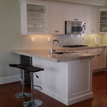 Kitchen Renovation of cabinets with full overlay and counter tops.