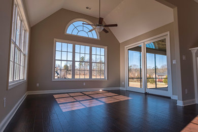 Home design - mid-sized transitional home design idea in Other