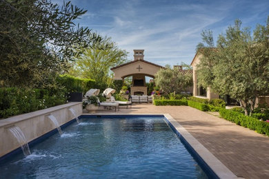 Large contemporary backyard rectangular lap pool in Phoenix.