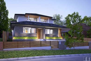 Inspiration for a contemporary two-storey duplex exterior in Sydney.