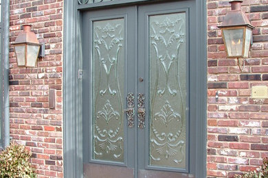 Large elegant entryway photo in Kansas City with a gray front door