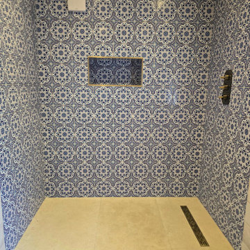 Blue and white patterned bathroom wall & floor tiling