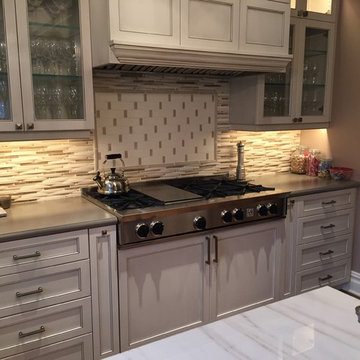A beautiful BlueStar kitchen with a 48" BlueStar Rangetop and custom cabinets