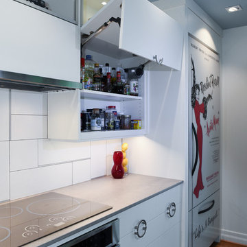 Horizontal bifold cabinet doors - up during prep & clean-up, down when done