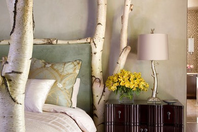 Example of a transitional bedroom design in Denver