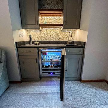 Wet Bar with Undercounter Beverage Center with Leathered Granite Countertop