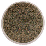 Bareens Designer Rugs - Nagi Pak Persian Mackenzi Green/Gray Wool Round - 6'3'' x 6'4'' - Designed with mesmerizing intricacy and gorgeous color palette, this hand-knotted masterpiece demonstrates the beauty and electrifying thrill of Pak Persian art. These meticulously hand-knotted Pak-Persian rug is made with pure wool and features breathtaking traditional, transitional, and tribal designs in bold luxurious color pallets. Known for their intricate designs these rugs are a reproduction of Persian rugs, made in Pakistan with unique Mughal designs. Made by master weavers using the same Persian texture, design and dying technique, we wanted to produce the most significant manifestation of Persian art, life, and culture. This rug is most famous for its exceptional quality, incredible designs, patterns, and vibrant rich color. Pak-Persian rugs made with Persian weave with high knot counts, which enables the high intricacy and detail found in the patterns are also referred to as "State of art", each color adds a rich beautiful detail in the artwork of this rug. The design, color, and beautiful chromatic composition with a vibrant sheen with intricate designs, exude beauty, elegance, and quality make this rug a masterpiece of its own.