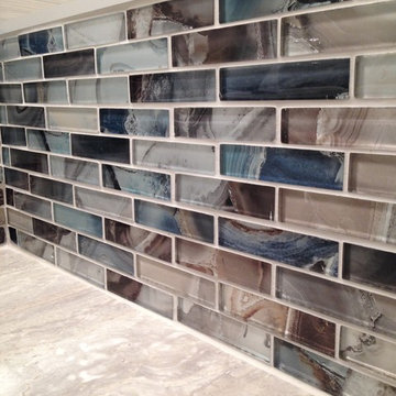 A glass backsplash with a color splash!