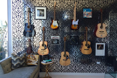 Home studio - large eclectic freestanding desk carpeted home studio idea in Austin with blue walls