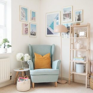Photo of a midcentury study in Other with white walls, carpet, no fireplace and beige floors.