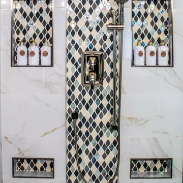 Primary Bath with Marble Look Tiled Shower and Free Standing Tub