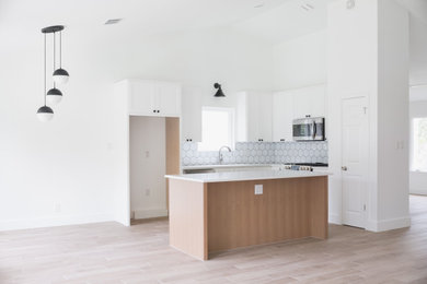 Inspiration for a mid-sized transitional home design remodel in Austin