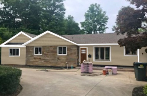 Front entry door style for ranch on main road