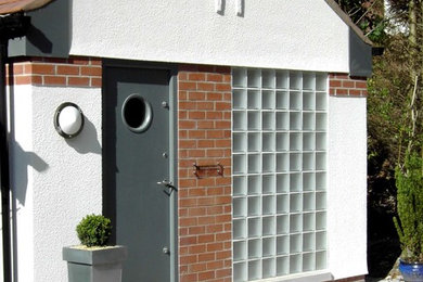 This is an example of a mediterranean detached office/studio/workshop in Cheshire.