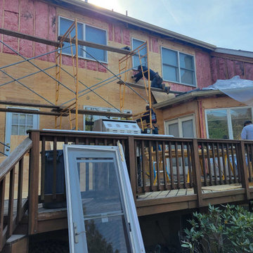 Stucco remediation with siding and windows installation, sheathing replacement
