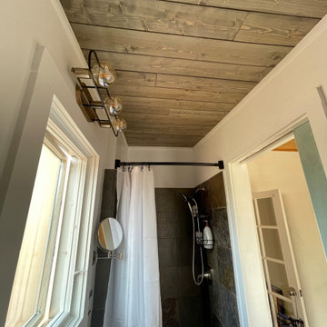 Fixing Ceiling Mishaps: Transforming an Unfinished Bathroom