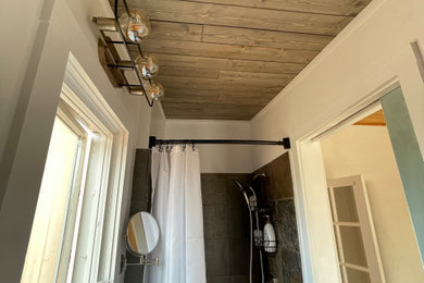 Inspiration for a rustic bathroom remodel in Albuquerque